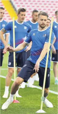  ??  ?? Iceland’s Kari Arnason runs through poles during a training session yesterday, ahead of today’s crucial FIFA World Cup Group D match against Nigeria in Moscow Russia.