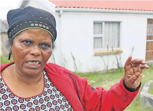  ?? Picture: SIBONGILE NGALWA ?? NO HOME SWEET HOME’: Sindiswa Magela says her family bought this NU6 house from Mdantsane ANC ward councillor Ntombizodw­a Gamnca for R300,000 but two other buyers say they bought it as well.