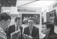  ?? PROVIDED TO CHINA DAILY ?? A view of the booth of Societe Generale during an expo in Shanghai.