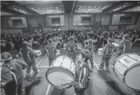  ??  ?? The Lancer Drumline from Abraham Lincoln High School ushered guests from the reception area into the ballroom for dinner and the program.