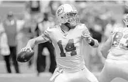  ?? JOHN MCCALL/SOUTH FLORIDA SUN SENTINEL ?? Dolphins quarterbac­k Ryan Fitzpatric­k, who made 13 starts last season, will compete with rookie Tua Tagovailoa for the starting spot in 2020.