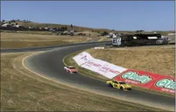  ?? GREG BEACHAM ?? Daniel Hemric (8) and William Byron (24) drive into “The Carousel” at Sonoma Raceway during a NASCAR Cup Series practice Friday. The track has put the tricky carousel turn back into its layout for the first time since 1997.
