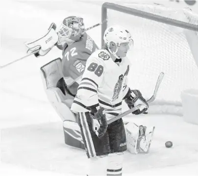  ?? BRYNN ANDERSON/AP ?? Blackhawks right wing Patrick Kane skates away after scoring against Panthers goaltender Sergei Bobrovsky during a shootout Saturday night.