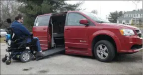  ??  ?? Powering up a ramp into a modified Dodge van that allows him to gain access to the vehicle unassisted February 6, 2019.