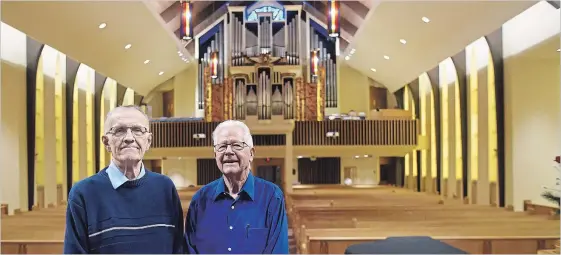  ?? DAVID BEBEE WATERLOO REGION RECORD ?? Peter Black and John Hill stand in the sanctuary of First United Church. They are part of a church committee that has found a way to host a new live music series at First United.