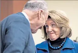  ??  ?? Can you believe it was so easy? Democratic leaders Chuck Schumer and Nancy Pelosi chuckle about the CBO’s scoring of the GOP health-care bill.