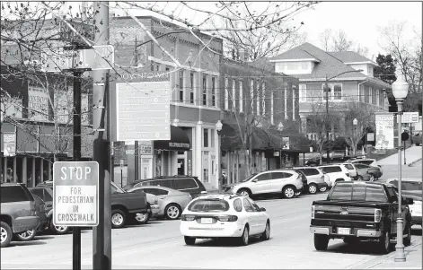  ?? NWA Democrat-Gazette/DAVID GOTTSCHALK ?? The downtown area of Siloam Springs March 3.