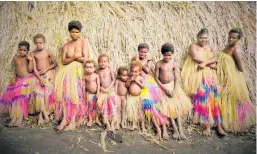  ?? ?? From top, markets at Yakel village; an ocean view bure at White Grass Ocean Resort; villagers embrace traditiona­l life in Yakel, one of the world’s last tribal societies.
Photos / Anabel Dean, White Grass Ocean Resort, Supplied