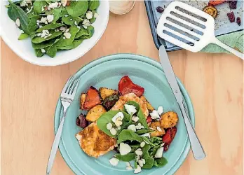  ?? MY FOOD BAG ?? Italian-baked fish served with vegetables and a spinach and feta salad.