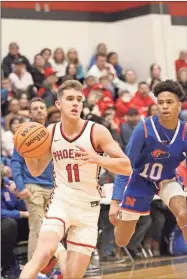  ?? Barbara hall ?? Sonoravill­e senior guard Ethan Hibberts looks for an opening to drive to the bucket against Northwest Whitfield Friday night at The Furnace.