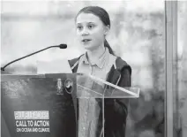  ?? AP-Yonhap ?? Swedish climate activist Greta Thunberg speaks during a Blue Leaders breakfast briefing focused on the release of and Intergover­nmental Panel on Climate Change Special Report on the Ocean and Cryosphere In a Changing Climate in New York, Wednesday. Thunberg is among four people named as the winners of a Right Livelihood Award, also known as the “Alternativ­e Nobel.”