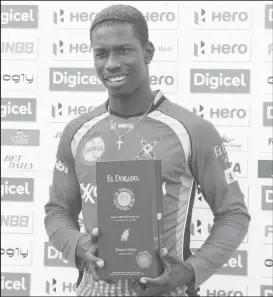  ??  ?? Kevin Sinclair displays his best celebratio­n award in the CPL