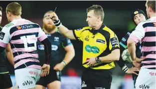  ??  ?? No laughing matter: Nigel Owens yellow cards Dan Fish of Cardiff Blues