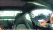  ?? IMAGE GRAB FROM VIDEO SHARED ON FACEBOOK ?? Two gang members engaged the driver in a conversati­on while one of them stole his phone.
