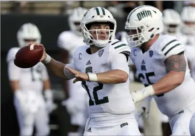  ?? MARK HUMPHREY — THE ASSOCIATED PRESS ?? Ohio quarterbac­k Nathan Rourke passes against Virginia in the first half of a game in Nashville, Tenn., on Sept. 15, 2018.