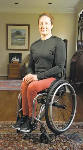  ?? KIM HAIRSTON/THE BALTIMORE SUN ?? Tatyana McFadden, 17-time Paralympic medalist, at her family’s home in Clarksvill­e.