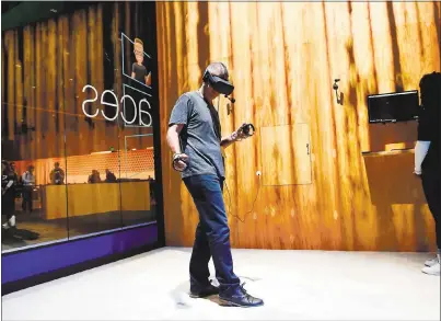  ?? GARY REYES/ BAY AREA NEWS GROUP ?? Ray Woodbury, of Claremont, tries out Facebook Spaces at Oculus Connect 4at the San Jose McEnery Convention Center in San Jose onWednesda­y. Facebook Spaces allows userswho have a virtual reality headset to play games, make calls, filmlive videos and...