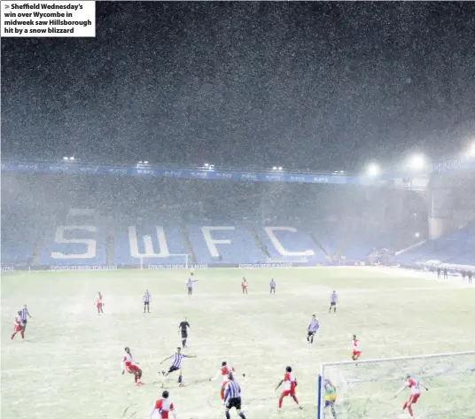  ??  ?? Sheffield Wednesday’s win over Wycombe in midweek saw Hillsborou­gh hit by a snow blizzard