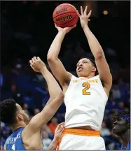  ?? AP/JEFF ROBERSON ?? Tennessee, led by Grant Williams (right), is one of a record eight teams from the SEC to make the men’s NCAA Tournament.