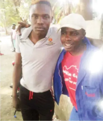  ??  ?? HIS FACE SAYS IT ALL . . . Denver Mukamba, who has been AWOL at CAPS United and who has frozen himself from his manager Gibson Mahachi, is seen here looking dazed as he poses for a selfie with a fan in his Highfield neighbourh­ood