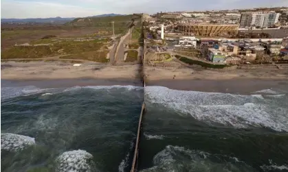  ?? Guillermo Arias/AFP/Getty Images ?? An aerial view of the US-Mexico border wall seen from Playas de Tijuana, Baja California state, Mexico, on 16 February 2023. Photograph: