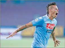  ?? CIRO DE LUCA / REUTERS ?? Napoli’s Marek Hamsik celebrates after scoring against Bologna during their Italian Serie A match at the San Paolo Stadium in Naples on Sunday.