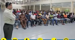  ??  ?? Workers attend an awareness session oraganised by the Abu Dhabi Judicial Department. —