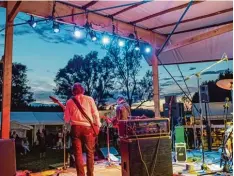  ?? Foto: Georg Drexel ?? Musik an einem Sommeraben­d unter freiem Himmel – das Waltenhaus­ener Festival „Ackerbeat“macht’s möglich.