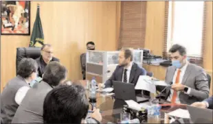  ??  ?? ISLAMABAD
Federal Minister for Railways, Azam Khan Swati chairing a meeting with Russain delegation at Ministry of Railways.
-APP