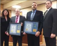  ?? EVAN BRANDT — MEDIANEWS GROUP ?? From left, Mayor Stephanie Henrick, Detective David Mull, Officer Gregory Fritz, Police Chief Mick Markovich after recognizin­g the two retiring officers for a combined 60 years of service to the Pottstown Police Department.
