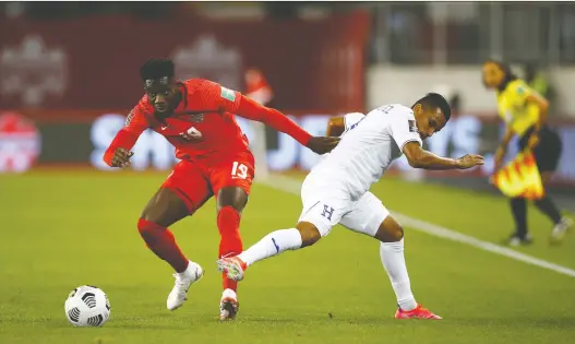  ?? VAUGHN RIDLEY/GETTY IMAGES ?? Alphonso Davies, left, may be playing before a hometown crowd in Edmonton if one or two of Canada's World Cup qualifying matches are moved to the city.