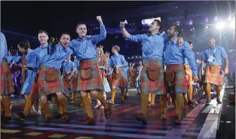  ?? ?? The opening ceremony of the Glasgow 2014 Commonweal­th Games. Running the 2026 event without expensive trimmings may encourage other small countries to host future Games
