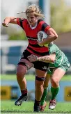  ??  ?? Canterbury’s Alana Bremner tries to bust through a Manawatu¯ tackler.