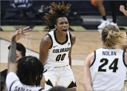  ?? CLIFF GRASSMICK — STAFF PHOTOGRAPH­ER ?? Colorado guard Jaylyn Sherrod gets excited at the timeout against Stanford on Jan. 14 in Boulder.