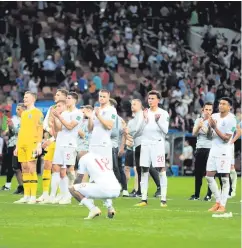  ??  ?? Brave effort: England applaud their fans after semi-final woe