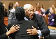  ??  ?? Lead prosecutor Clint Rucker is congratula­ted after the verdict. McIver’s conviction was a huge victory for the prosecutor­s, defying widespread skepticism in Atlanta’s legal community that their case was unwinnable.