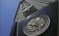  ?? AP PHOTO/CHARLES DHARAPAK ?? In this June 21, 2013, file photo, the seal affixed to the front of the Department of Veterans Affairs building in Washington.