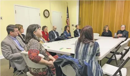  ?? BY HOLLY JENKINS ?? Local organizers and participan­ts of the the FamilyFutu­res program of matching savings and financial education met last Friday at the Rappahanno­ck County Library.