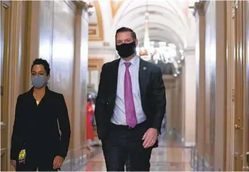  ?? STEFANI REYNOLDS AP ?? Rep. Eric Swalwell, D-Castro Valley, (right) has filed a civil suit against former President Donald Trump, claiming he should be held liable for injuries and destructio­n caused by the Jan. 6 mob assault on the Capitol.