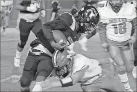  ?? Jeremy Stewart ?? Rockmart’s Javin Whatley (left) runs into Murray County’s Taylor Carrell during Friday’s game.