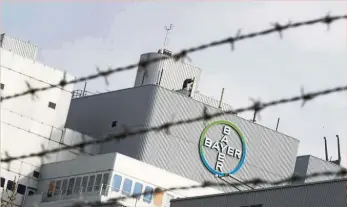  ?? AFP ?? Within expectatio­ns: Bayer logo is seen at the group’s coumpound in Berlin. The headline number of Us$11bil is in the region that analysts had estimated Bayer would cost to settle litigation around Roundup. —