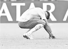  ??  ?? Brazil’s forward Neymar reacts to their defeat at the end of the Russia 2018 World Cup quarter-final football match between Brazil and Belgium at the Kazan Arena in Kazan on July 6, 2018. Belgium beat World Cup favourites Brazil 2-1 on Friday to set up...