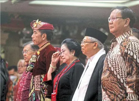  ?? — Jp/ann ?? Shaky ties: (From left) Vice President Jusuf Kalla, Jokowi, Megawati and president-elect Prabowo Subianto (far right) attending the opening ceremony of the fifth PDI-P congress in Bali in 2019.