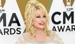  ?? JASON KEMPIN/GETTY ?? Dolly Parton attends the CMA Awards in November 2019 in Nashville, Tennessee. Parton is reading a children’s story once a week in series called “Goodnight With Dolly.”