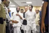  ?? — PTI ?? Congress leaders Rahul Gandhi and Ghulam Nabi Azad return from Srinagar at IGI Airport in New Delhi on Saturday. A delegation of Opposition leaders which visited Srinagar to assess the situation in the Kashmir Valley were sent back from the airport by J&K authoritie­s.