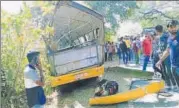  ?? HT ?? The bus was carrying 16 kindergart­en students back home from school when the driver lost control after crossing a bridge.