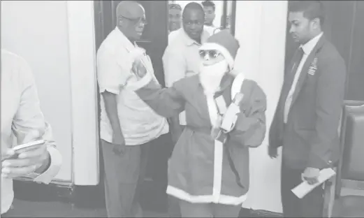  ??  ?? The ‘Santa’ managed to exit the Public Buildings without being apprehende­d after disrupting the proceeding­s