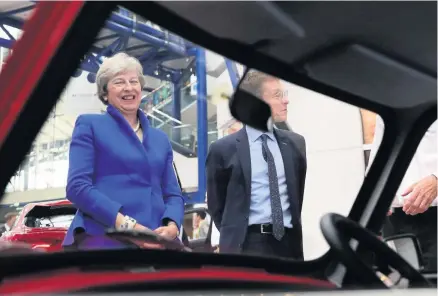  ??  ?? &gt; Prime Minister Theresa May at the Zero Emission Vehicle Summit at the ICC in Birmingham this week