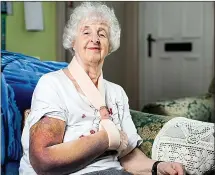  ??  ?? Recovering... Anne Willis at home with her arm in a sling after she was attacked twice; far left, a letter sent to her from a local primary school inviting her for a cup of tea after they heard of her plight; right, a Get Well Soon card made by concerned children at the school