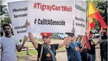  ?? | EPA ?? MEMBERS of the Tigrayan Community in South Africa gather outside the US Embassy in Pretoria, calling for the end to their claimed genocide of the Tigray communitie­s in Ethiopia which are under a blockade. The role of non-african actors should be ancillary rather than central to the negotiatio­ns in Pretoria, says the writer.